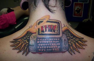 Illustration for article titled The 9 Most Terrible Tech Tattoos
